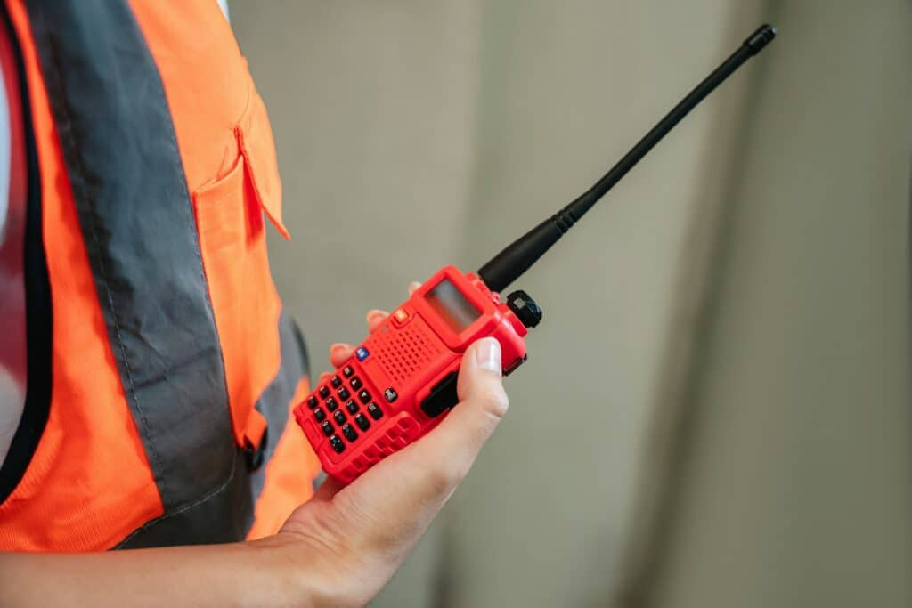 Close-up a talkie for an emergency in a factory worker. to be able to cope in time.