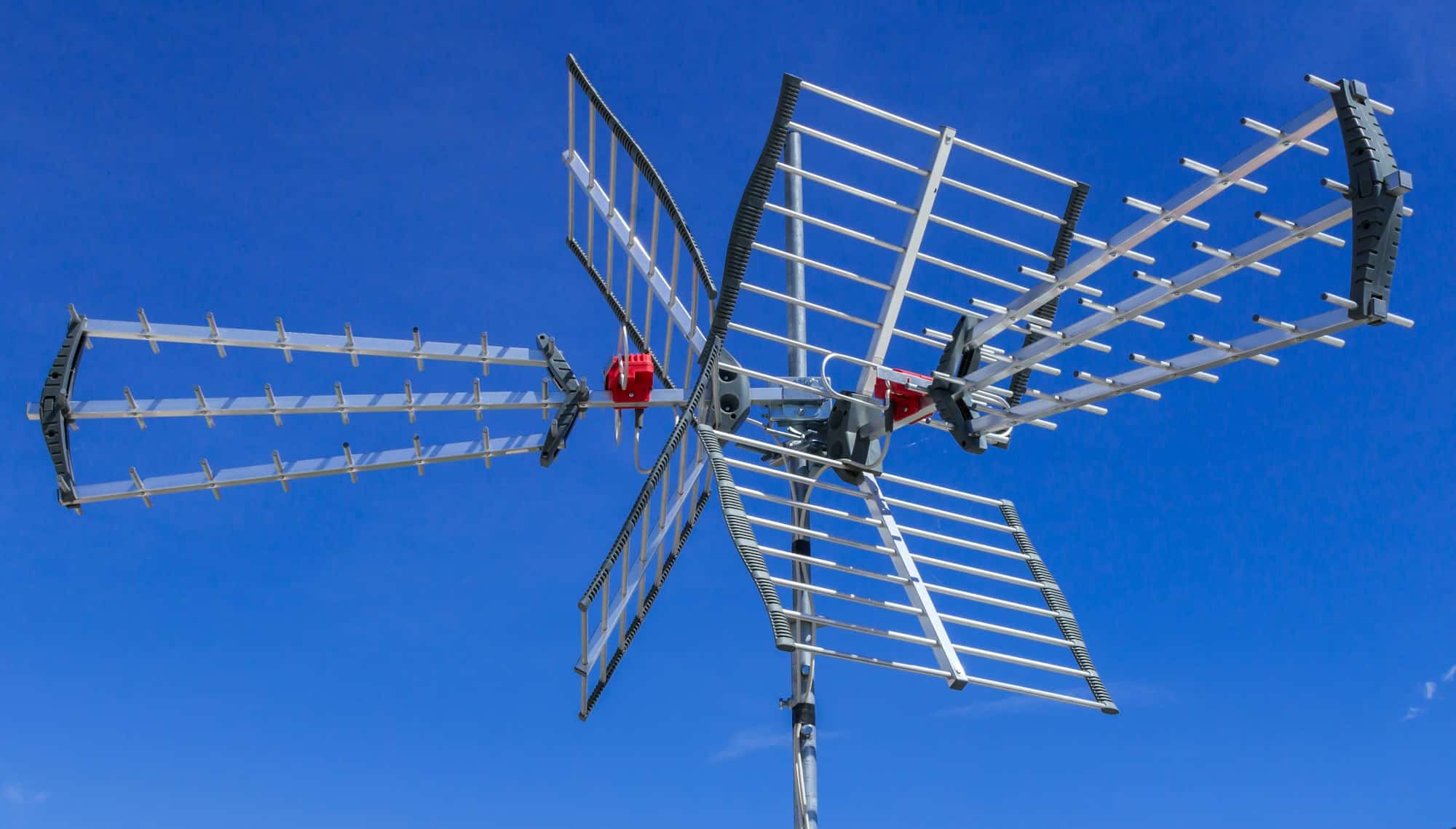 Tv antenna against blue sky